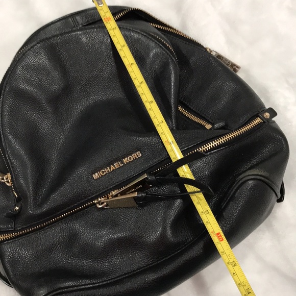 Michael Kors backpac with multiple pockets. Outside has some stains as pictured - Picture 12 of 15